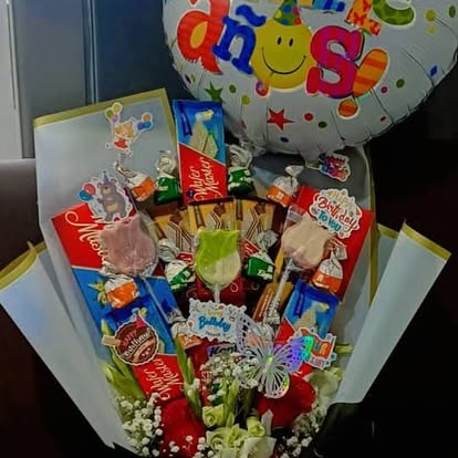 Dulces y un globo alegre
